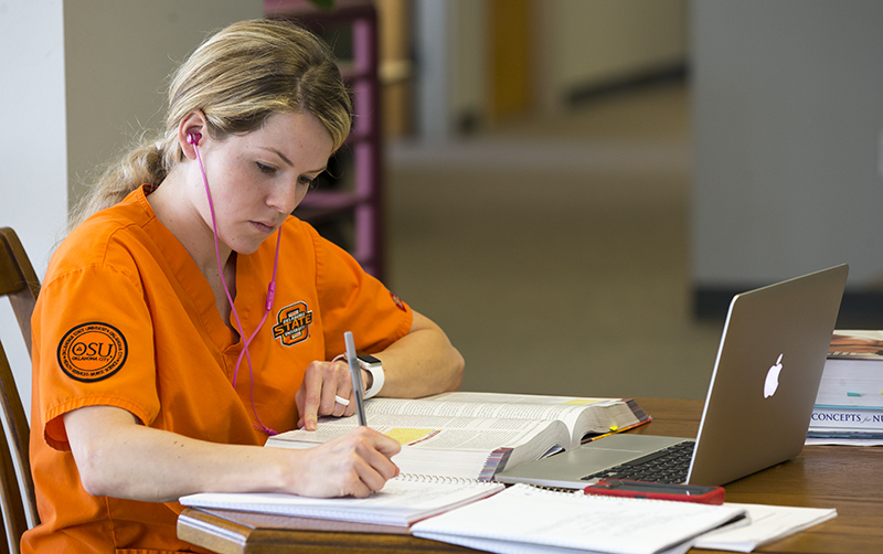 student using computer student using computer